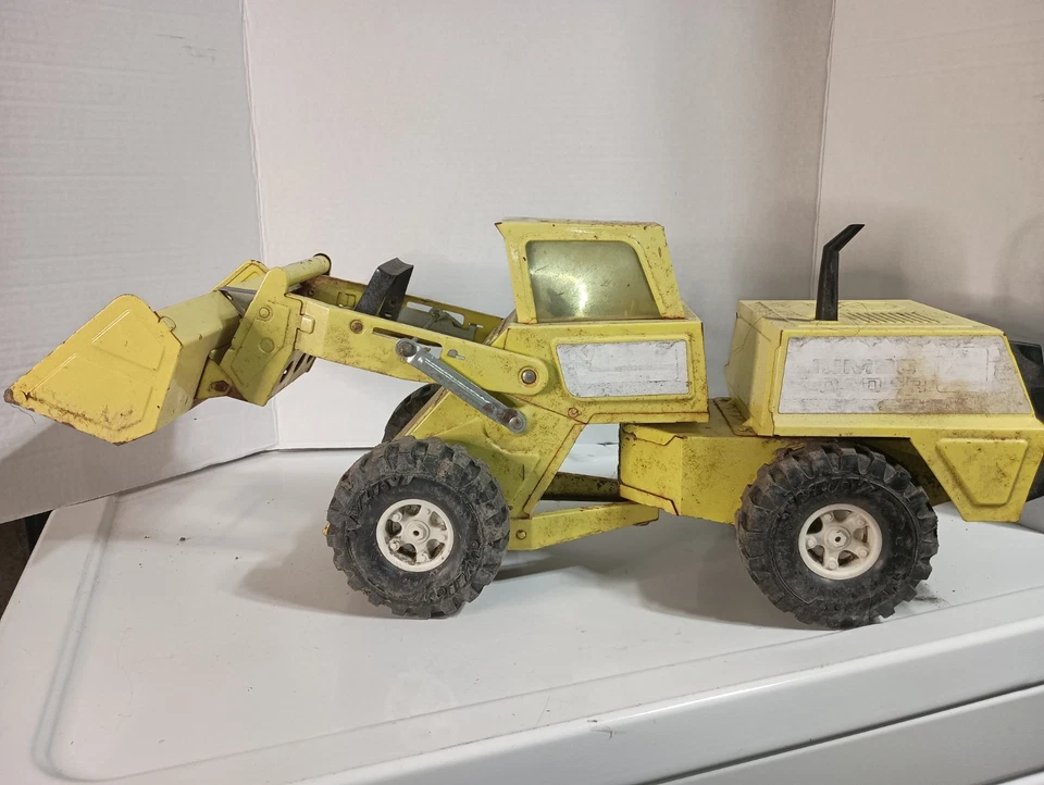 Camión delantero elefante antiguo de construcción de acero prensado NYLINT JUMBO LOADER Foto 1 de 4