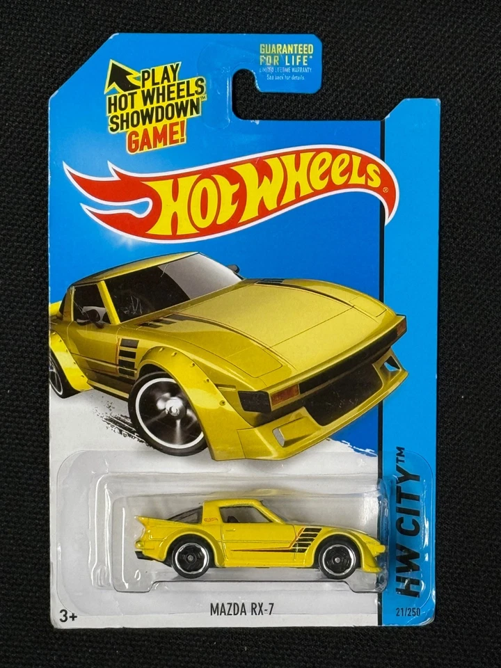Mazda RX-7 2014 Hot Wheels HW City #21/250 en amarillo - error - pintura funciona y agrieta Foto 1 de 4