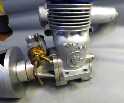 BONITO MOTOR SUPER TIGRE G.60 R/C LIGERAMENTE USADO GRAN COMPRESIÓN GIRA SUAVE Foto 1 de 4