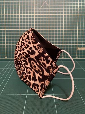 Mascarilla facial de tela con estampado de leopardo animal adulto hecha a mano lavable 5 Foto 1 de 4