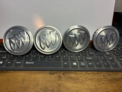 Buick LaCrosse Verano Regal Encore GX center cap set of 4 2003 2023 p/n 9595157 - Image 1 of 4