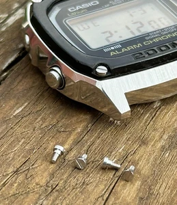 Casio DW-1000 4x Bezel Screws Replacement Vintage Spare Part 280 DW1000 DW1400 - Picture 1 of 2