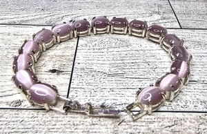 Avon lila Katzenauge Armband silberfarben Gliederarmband 7" - Bild 1 von 4