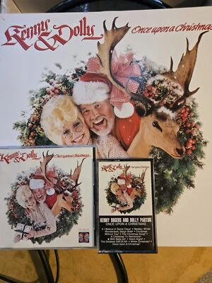 KENNY AND DOLLY ONCE UPON A CHRISTMAS- GREEN VINYL,CASSETTE AND CD. - Image 1 of 4