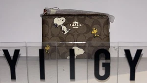 ๐ผ๐ฆ Coach CF214 ๐ผ๐ฆ Peanuts Snoopy Woodstock Canvas Khaki Wristlet Bag ๐ผ D25 - Picture 1 of 8
