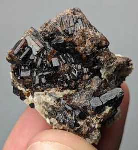 Natural rare dark Vesuvianite cluster with Albite reddish terminations - Picture 1 of 7