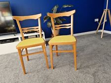 Two ~1960s Ligna chairs- solid wood & yellow formica(?) seat pad