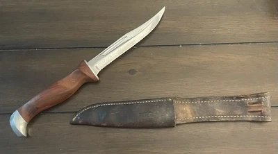 Cuchillo de caza vintage Cutco 1069 hoja fija dentada con funda de cuero marrón Foto 1 de 4