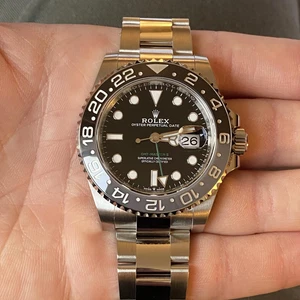 New Release Rolex GMT-Master II Steel Black Gray Bezel Watch 126710GRNR - Picture 1 of 3