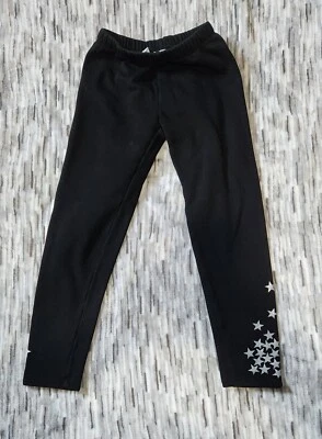 Pantalones deportivos Gap Kids negros estrellas plateadas talla grande Foto 1 de 4