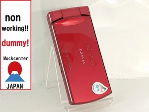 【Factice !】 Sony Ericsson SOY02 BRAVIA (couleur rouge) au-japon téléphone portable qui ne fonctionne pas - Photo 1 sur 4