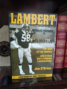 LAMBERT: Man in the Middle_Jim O'Brien_HCDJ_1st Edition_Steelers_2004_Very Good - Imagen 1 de 14