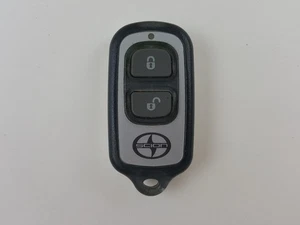 ORIGINAL SCION XB XA 04-06 OEM KEY LESS ENTRY REMOTE FOB 3-BUTTON ALARM SILVER - Foto 1 di 13