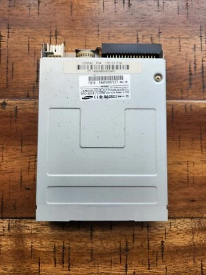 Samsung SFD-321B/LCPN2 , 1.44 Gray Floppy Disk Drive ,*No Bezel No Button* - Image 1 of 4