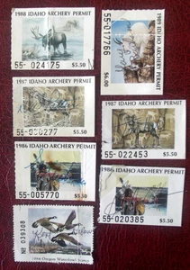 2 Idaho Archery Hunting Stamps  Lot#99z  flaws - Picture 1 of 1