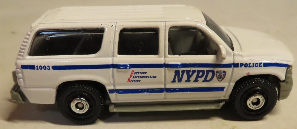 1999 MATCHBOX '00 CHEVY SUBURBAN NYPD WHITE 1:76 DIECAST 3" POLICE TRUCK W BLUE - Image 1 of 4