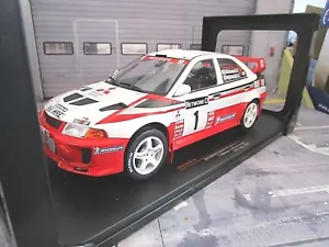 MITSUBISHI Lancer RS Evolution MKV 5 Rally Mondiali RAC #1 Mäkinen 1998 IXO 1:18 - Foto 1 di 5