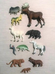 Konvolut Spielfiguren Tiere Elche Zebra Bär Tiger Lama Affe Büffel Hippo Jaguar - Bild 1 von 6