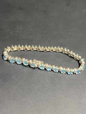 PULSERA TENIS PLATA ESTERLINA 925 Y TOPACIO AZUL Foto 1 de 4