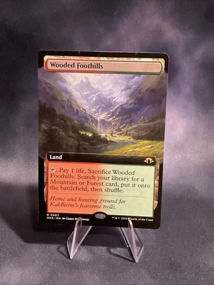 Wooded Foothills (Extended Art) Modern Horizons 3 Regular - Image 1 of 2