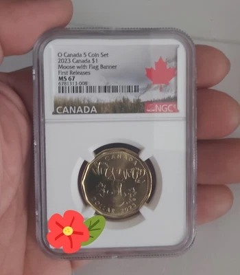 TOP GRADE 2023 $1 Canada coin MOOSE W/ FLAG BANNER 1st Release NGC MS-67 BID LOW - Image 1 of 2