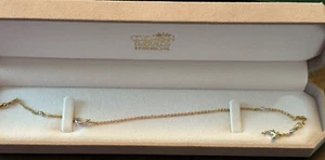 KOLUMBIANISCHE SMARAGDE INTERNATIONAL 14 KT GOLD DELFIN ZWEIFARBIGES FUSSKETTCHEN ADJ ARMBAND - Bild 1 von 6
