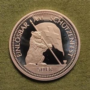 SWITZERLAND - 1994 silver 50 Franc - St Gallen Shooting festival - lightly toned - Picture 1 of 2