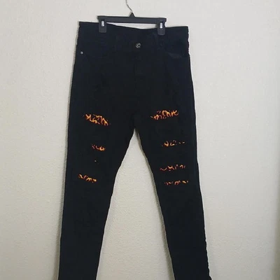 Pantalones de mezclilla ajustados Rue21 negros y naranjas Foto 1 de 4