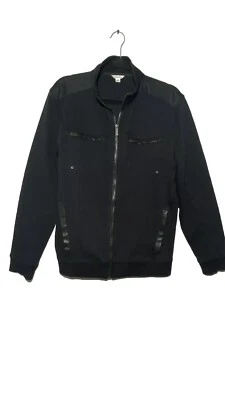 Chaqueta con ribete de cuero sintético negra Calvin Klein cremalleras doradas talla mediana Foto 1 de 4