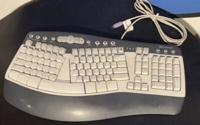 Microsoft Natural Multimedia Keyboard Ergonomic Comfort 1.0A  Model RT9470 Wired - Image 1 of 2