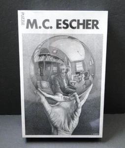 M.C. Escher: Hand with Globe 1000 Piece Puzzle - Picture 1 of 16