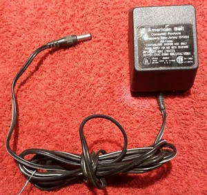 E40)   American Bell #PS1000, AC-AC Power Adapter. Output: AC 12V, 830mA, 5.5mm - Picture 1 of 2