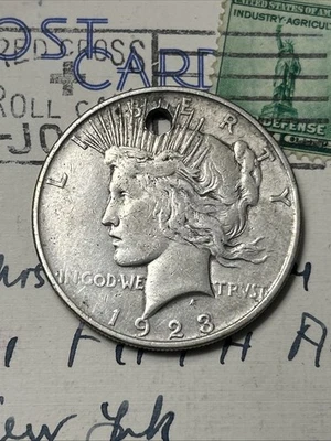 Holed 1923-D Peace Dollar 🇺🇸 - Image 1 of 4