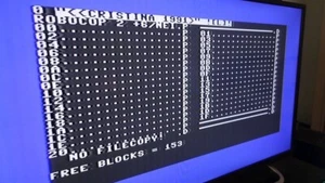 GIOCHI floppy disk c64 commodore 64 Robocop Double Dragon Shinobi ghostbuster - Afbeelding 1 van 2