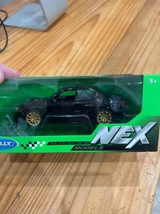 Welly 1:24 Subaru WRX STI Diecast Metal Model Car Vehicles Black 22487BK - Picture 1 of 3