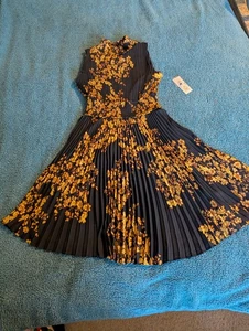 Nanette Lepore Kleid Gr. 12 schwarz gold Blumen Plissee ärmellos Boho elegant  - Bild 1 von 15