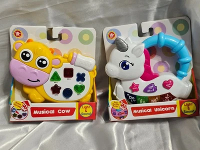 JUEGO DE DOS JUGUETES MUSICALES PARA 18+ MESES - UNICORNIO MUSICAL Y VACA MUSICAL AMBOS NUEVOS Foto 1 de 4
