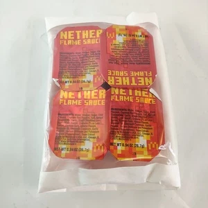 Lotto di 4 pepita di pollo McDonald's NETHER FLAME Minecraft Movie Sauce Immersione - Foto 1 di 6