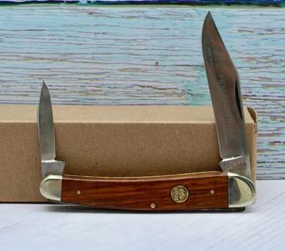 Cuchillo de colección Puma 835 Junior 1973 primer cuarto con escalas de madera Jacaranda Foto 1 de 4