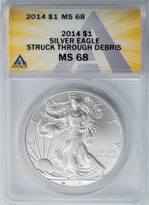 2014 American Silver Eagle $ Struck Through Debris MS68 ANACS 949979-6 - Image 1 of 3