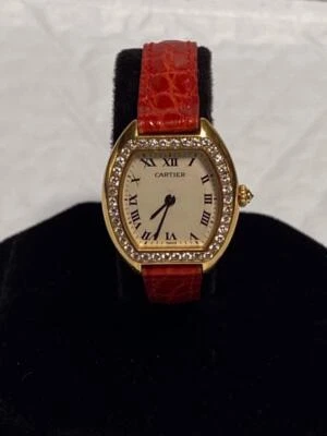 RELOJ DE CUARZO CARTIER TORTUE ORO AMARILLO 18K FÁBRICA BISEL DIAMANTE 24mm. Foto 1 de 4
