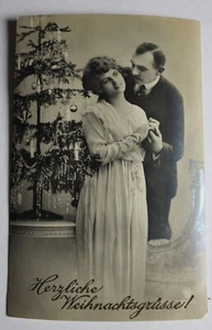 AK Herzl. Weihnachtsgrüße, Pärchen vor Weihnachtsbaum, um 1925 - Bild 1 von 2