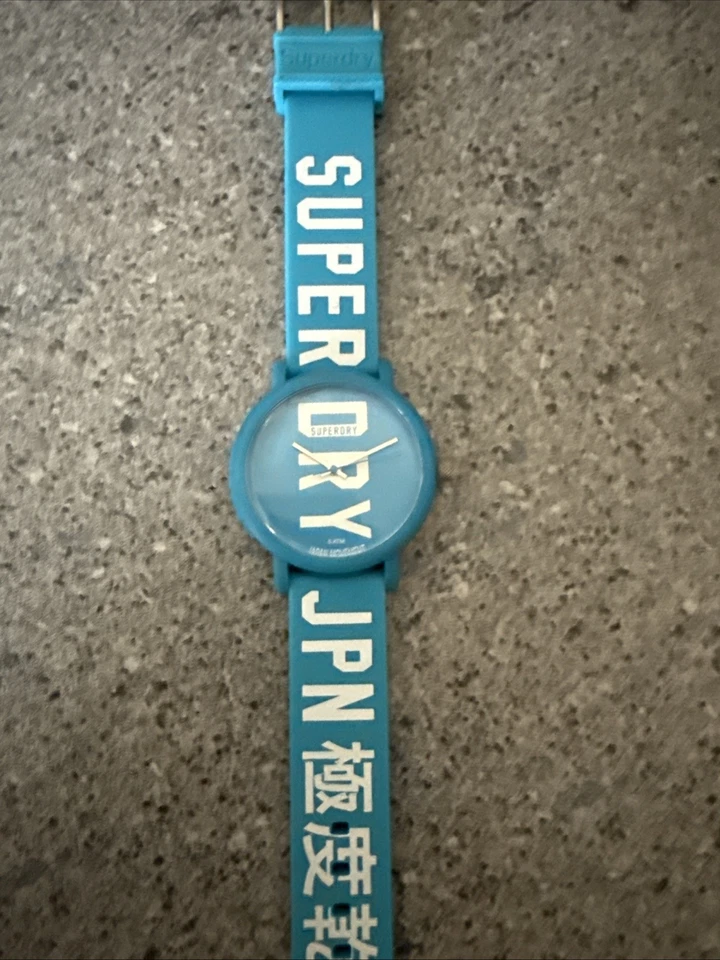 Superdry Hombre Reloj Azul Brillante, Sin Usar, Batería Nueva. Excelente Estado Foto 1 de 3