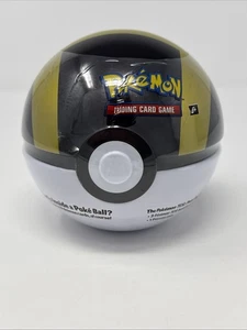 New Sealed Pokemon TCG Poke Ball Black/Gold Tin with 3 Booster Packs & 1 Coin - Picture 1 of 6
