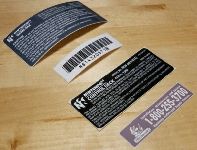 Nintendo 64 N64 NUS-001 (EE. UU.) Mantenimiento Código de Barras Control Deck GamePak JUEGO DE ETIQUETAS Foto 1 de 4