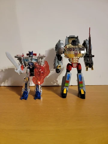 Transformers AOE Deluxe Class Silver Knight Optimus & Grimlock Hasbro 2014 Cover