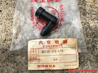 NOS Tapa Bujía Logo HM HONDA CZ100 Z50M Z50A CT70 CF70 Z50 ST50 ST70 QA50  Foto 1 de 4