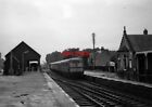 PHOTO  NAIRN RAILWAY STATION 3 CAR INTER CITY SET AND PARCELS VAN AIVING AT A  W
