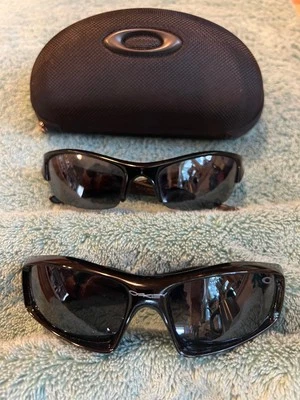 Paquete de gafas de sol Oakley Monster Pup & Flak Jacket - con lentes adicionales y estuche Foto 1 de 4