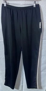 Pantalones de chándal New Balance para hombre grandes negros de poliéster ajuste cónico con cremallera piernas - Imagen 1 de 5